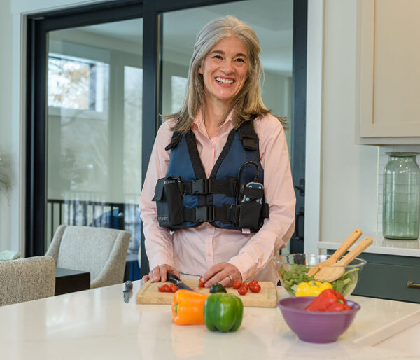 woman wearing afflovest 6th gen vest